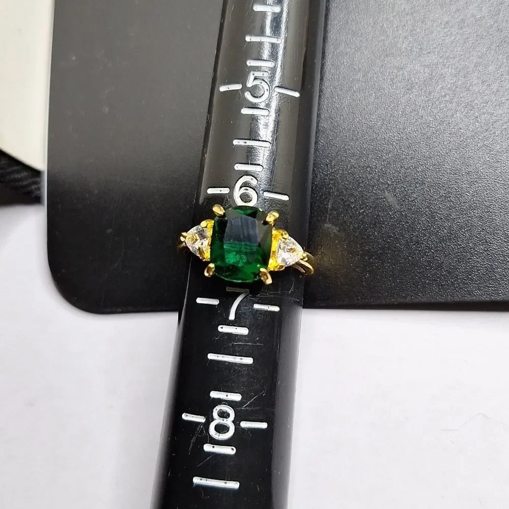 EMERALD cut green stone engagement ring